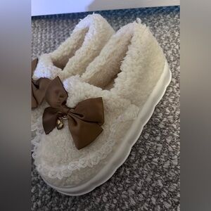 Francesca's Collections Cream Sherpa Slippers with Brown Bow